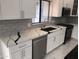 Modern kitchen with white cabinets and quartz countertops at 15869 E Ponderosa Dr, Fountain Hills, AZ 85268