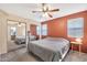 Spacious bedroom with mirrored closet and ceiling fan at 1604 W Kerry Ln, Phoenix, AZ 85027