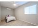 Bedroom with a bed, ceiling fan, and window with blinds at 1637 W Tierra Buena Ln, Phoenix, AZ 85023