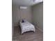 Small bedroom with a twin-size bed and AC unit at 1637 W Tierra Buena Ln, Phoenix, AZ 85023