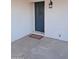 Front entry with teal door and a welcoming mat at 1637 W Tierra Buena Ln, Phoenix, AZ 85023