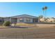 Single story home with attached garage and desert landscaping at 1637 W Tierra Buena Ln, Phoenix, AZ 85023