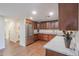 Modern kitchen with stainless steel appliances and granite countertops at 1637 W Tierra Buena Ln, Phoenix, AZ 85023