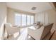 Bright living room with sliding glass doors and comfortable seating at 1637 W Tierra Buena Ln, Phoenix, AZ 85023