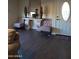 Living room with two accent chairs and a console table at 1637 W Tierra Buena Ln, Phoenix, AZ 85023