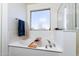 Bathroom with soaking tub and window at 1647 W Gold Mine Way, San Tan Valley, AZ 85144