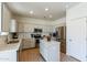 Modern kitchen with stainless steel appliances and an island at 1647 W Gold Mine Way, San Tan Valley, AZ 85144