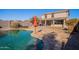 Sparkling pool with patio and view of house at 1647 W Gold Mine Way, San Tan Valley, AZ 85144