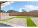 Backyard with artificial turf and patio area at 16747 W Cielo Grande Ave, Surprise, AZ 85387