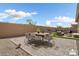 Patio with outdoor dining set and grill at 16747 W Cielo Grande Ave, Surprise, AZ 85387