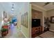 A spacious hallway with wood-look tile floors and decorative wall accents at 17716 E Silver Sage Ln, Rio Verde, AZ 85263