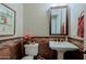 Small powder room with pedestal sink and decorative tile at 17716 E Silver Sage Ln, Rio Verde, AZ 85263