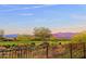 Scenic view of a golf course and mountain range at 17716 E Silver Sage Ln, Rio Verde, AZ 85263