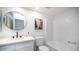 Updated bathroom with white vanity and walk-in shower at 1834 W Kerry Ln, Phoenix, AZ 85027