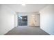 Bedroom with sliding door to patio and bathroom at 1834 W Kerry Ln, Phoenix, AZ 85027