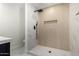 Modern bathroom with a large walk-in shower and marble tile at 1936 E Cornell Dr, Tempe, AZ 85283