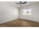 Bright bedroom with wood floors and ceiling fan at 1936 E Cornell Dr, Tempe, AZ 85283