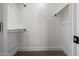 Spacious closet with double hanging rods and a shelf at 1936 E Cornell Dr, Tempe, AZ 85283