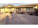 House exterior showcasing brick facade, and neatly landscaped front yard at 1936 E Cornell Dr, Tempe, AZ 85283