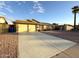 Two-car garage and brick house with well-maintained landscaping at 1936 E Cornell Dr, Tempe, AZ 85283