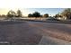 Landscaped front yard with gravel driveway and park views at 1936 E Cornell Dr, Tempe, AZ 85283