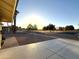 Neat front yard showcasing a paved walkway and tree-lined street view at 1936 E Cornell Dr, Tempe, AZ 85283