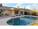 Home features a sparkling pool and a large backyard patio at 1936 E Cornell Dr, Tempe, AZ 85283