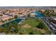 Aerial view of community green space near lake at 19847 N 108Th Ave, Peoria, AZ 85373