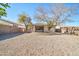 Large backyard with gravel and a view of the house at 19847 N 108Th Ave, Peoria, AZ 85373