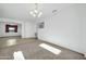 Spacious dining room with carpet, chandelier, and view to kitchen at 19847 N 108Th Ave, Peoria, AZ 85373