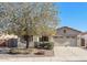 One-story house with attached garage and landscaping at 19847 N 108Th Ave, Peoria, AZ 85373