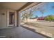 Covered patio overlooking the backyard landscape at 19847 N 108Th Ave, Peoria, AZ 85373