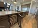 Kitchen island with built-in wine cooler at 22034 N 59Th Pl, Phoenix, AZ 85054