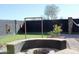 Backyard with fire pit and sitting area at 22233 N 76Th Dr, Peoria, AZ 85383