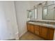 Bathroom with double sinks and granite countertop at 22233 N 76Th Dr, Peoria, AZ 85383