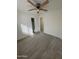 Well-lit bedroom featuring a ceiling fan and closet at 22233 N 76Th Dr, Peoria, AZ 85383