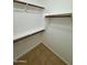 Large closet with double hanging rods and shelves at 22233 N 76Th Dr, Peoria, AZ 85383