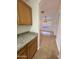 View of dining room from kitchen area with tile flooring at 22233 N 76Th Dr, Peoria, AZ 85383