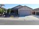 One-story house with desert landscaping and a two-car garage at 22233 N 76Th Dr, Peoria, AZ 85383