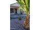 Front entrance with security door and stone pathway at 22233 N 76Th Dr, Peoria, AZ 85383