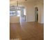 Spacious living room with tile floors and views to kitchen at 22233 N 76Th Dr, Peoria, AZ 85383