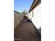 Side yard with gravel and AC unit at 22233 N 76Th Dr, Peoria, AZ 85383