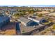 Aerial view showcasing house, backyard, and surrounding neighborhood at 25587 N Boreas Rd, Florence, AZ 85132