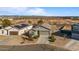 Aerial view of a house with desert landscape, showcasing the property and surrounding area at 25587 N Boreas Rd, Florence, AZ 85132