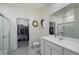 Clean bathroom with walk-in shower, vanity, and large mirror at 25587 N Boreas Rd, Florence, AZ 85132