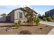 Landscaped front yard with drought-tolerant plants at 25587 N Boreas Rd, Florence, AZ 85132