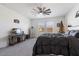 Main bedroom with king-size bed and plenty of natural light at 25587 N Boreas Rd, Florence, AZ 85132