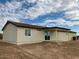 New home with covered patio and neutral color scheme at 25603 W Hedgehog Rd, Wittmann, AZ 85361