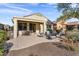 Home exterior showcasing patio and landscaping at 26637 W Irma Ln, Buckeye, AZ 85396