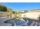 Relaxing kidney-shaped pool, surrounded by desert landscaping at 28548 N 68Th Ave, Peoria, AZ 85383